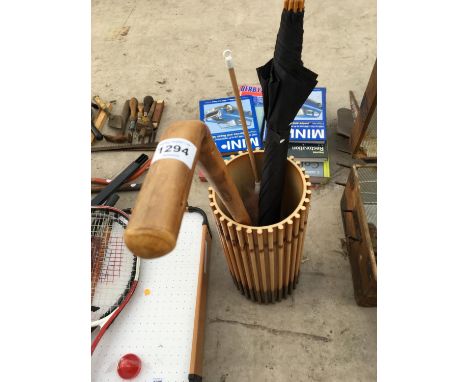 A CERAMIC UMBRELLA/STICK STAND RESEMBLING BAMBOO WITH A WALING STICK AND UMBRELLA 