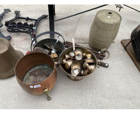 A FOOTED COPPER CAULDRON, A BRASS JAM PAN, SET OF BELLOWS, AN EPNS PUNCH BOWL SET, FOUR METAL ROPE LADDER RUNGS AND A STONEWA