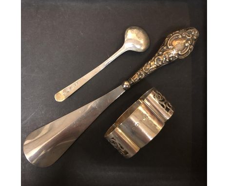 A HALLMARKED SILVER SHOE HORN 38G, A HALLMARKED SILVER NAPKIN RING 20G AND A HALLMARKED SILVER SPOON 6.7G 