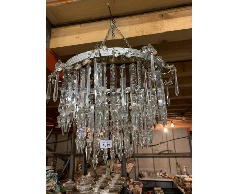 AN EDWARDIAN CUT GLASS CHANDELIER WITH THREE RINGS 