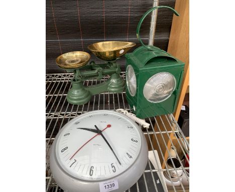 A SET OF SCALES AND WEIGHTS, A CLOCK AND A RAILWAY LAMP 