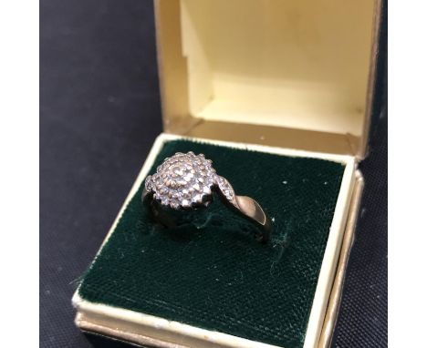 A 9CT GOLD RING WITH DIAMONDS 