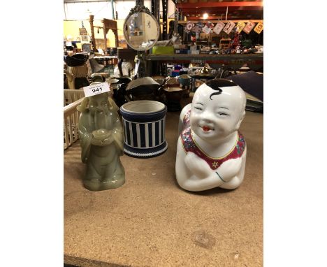 TWO ORIENTAL STYLE FIGURES, ONE GREEN SOAPSTONE AND ANOTHER CERAMIC 