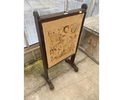 A REGENCY MAHOGANY FIRESCREEN WITH WOOLWORK PANEL DEPICTING EXOTIC BIRD, RABBIT AND FLOWERS, WITH ADJUSTABLE PULL-OUT PANEL, 