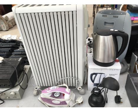 AN OIL FILLED RADIATOR, IRON, LAMP AND KETTLE  BELIEVED WORKING BUT NO WARRANTY 