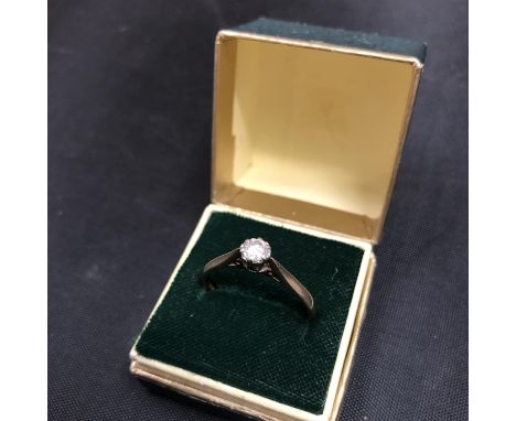 A 9CT GOLD DIAMOND SOLITAIRE RING 