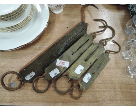A selection of vintage pocket balance scale