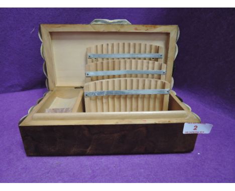 A vintage cigarette dispenser and humidor with bone inlay decoration