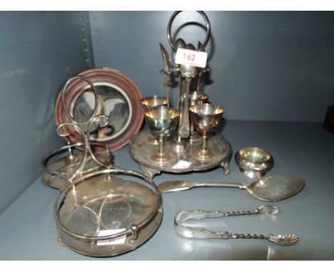 A selection of vintage metal and plated table wares including sauce set