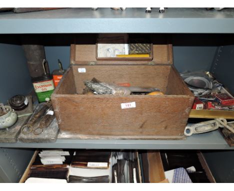 A selection of vintage hardware and trinkets including locks and keys