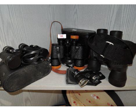 A selection of vintage binoculars including by Tecnar and Boots pacer