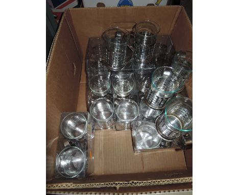 A selection of vintage as new glass and metal holder coffee cups