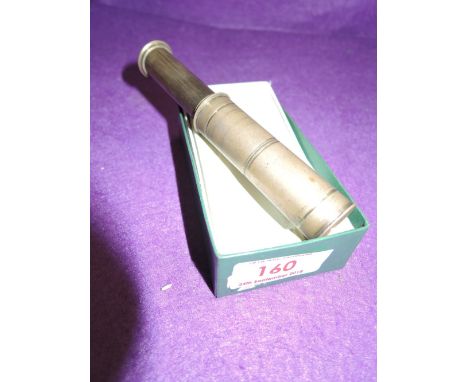 A vintage miniature brass bodies telescope