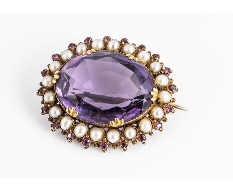 An amethyst oval brooch, the mixed oval cut central amethyst, in trefoil claw setting, with a heal pearl border and amethyst 