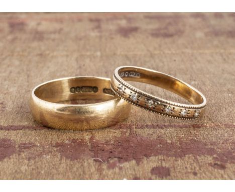 Two 9ct gold wedding bands, one set with small eight cut diamonds, the other D shaped, both ring size M, 3.9g