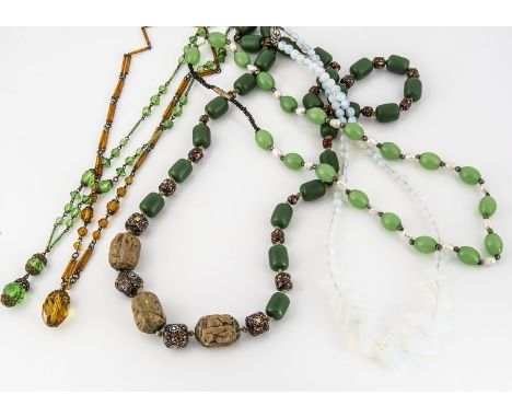 An Art Deco opalescent glass graduated necklace, together with a green oval bead and fresh water pearl necklace, a green and 