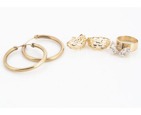 A continental yellow metal and paste set ring, marked 14k to the inner shank ring size K, together with a pair of hoop earrin