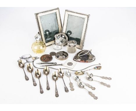 A collection of silver and other items, including a Victorian tortoiseshell heart shaped and silver mounted paperweight with 