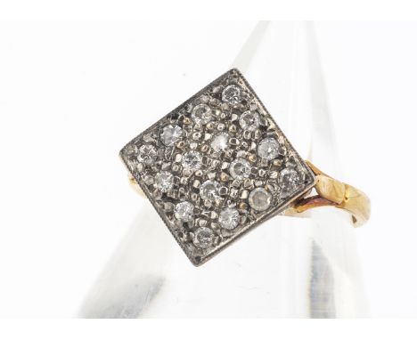 A diamond set brilliant cut tablet dress ring, the lozenge shaped tablet encrusted with brilliant and eight cut diamonds, rin