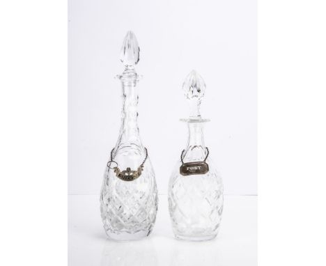 Two cut glass decanters and stoppers with silver decanter labels, one for Sherry, the other for Port, tallest decanter 39cm (