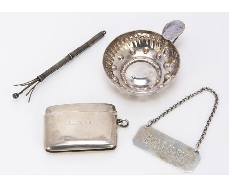 Three collectable silver items, including a swizzle stick, a vesta case and a Brandy decanter label, together with a silver p