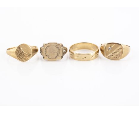 A collection of 9ct gold rings,  including two signet rings, a wedding band and a coin ring, 14g