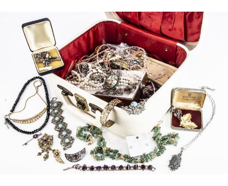 A collection of costume Jewels, including a garnet brooch, a large collection necklaces, bracelets, marcasite set bow, Bilsto