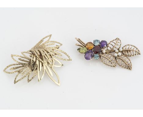A 9ct gold gem set leaf brooch, the open worked leaves,  with gem set stems of Zircon, garnet, amethyst, citrine and peridot,