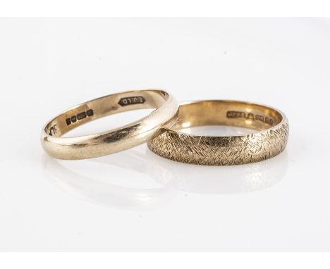 Two 9ct gold wedding bands, both D shaped one engraved ring size M, and an plain example size L, 3.7g