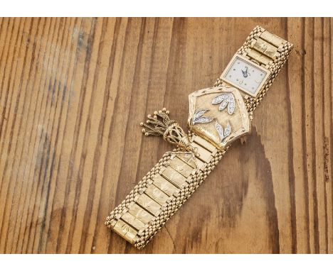 A c1970s Hamilton 14ct gold and diamond set lady's cocktail dress wristwatch, 18mm wide, on long multi link bracelet with tas