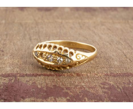 An 18ct gold diamond five diamond ring, the eight cuts in sunken settings, pierced surrounds, one setting vacant, ring size O