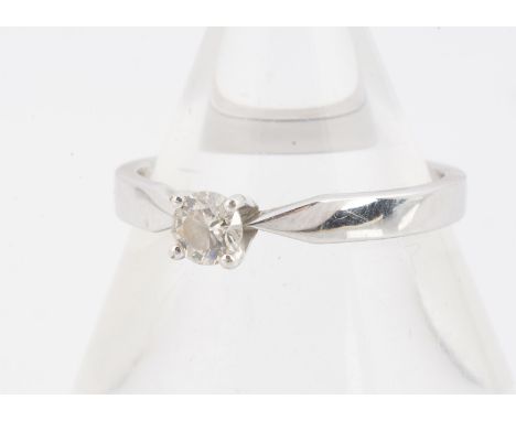 A certificated 9ct white gold diamond solitaire ring,  the brilliant cut, in four claw setting, tapered shank, diamond 0.25ct