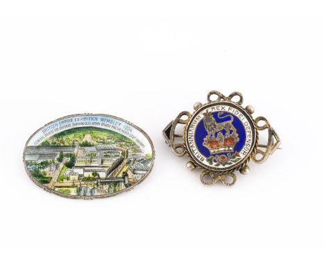A oval base metal and enamel 1924 Empire Exhibition brooch circa 1924, together with a George IV enamel shilling, within a wh