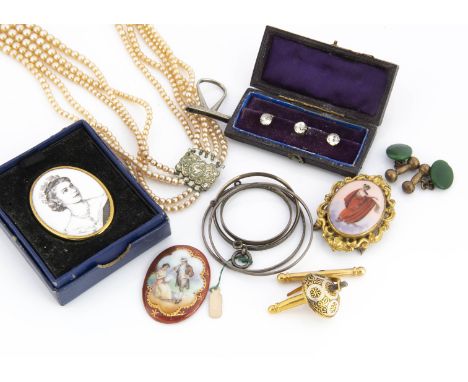 A oval porcelain transfer printed panel, another mounted in a belt buckle, a five strand simulated pearl necklace, a pair of 