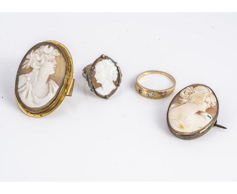 Three shell cameos, comprising a scarf toggle, an oval brooch and a silver ring, together with an 18ct gold diamond set dress