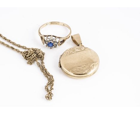 A small collection of gold, including a locket, chain, and cluster ring, 9.6g
