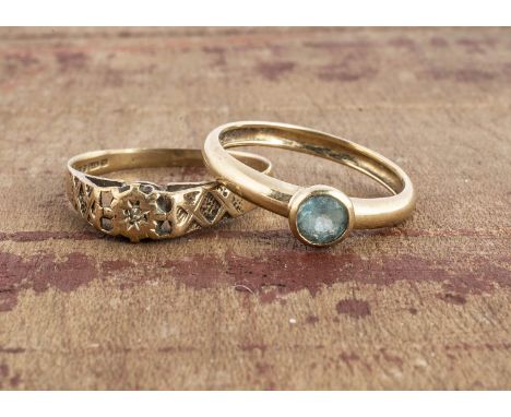 Two 9ct gold ring, one set with  a gypsy set diamond, ring size Y, together with another with blue stone ring size V, 4.7g