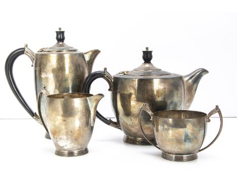 An Art Deco period silver four piece tea set by James Dixon &amp; Sons, comprising teapot, hot water pot, milk jug and sugar 