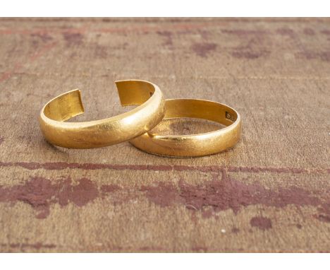 Two 22ct gold wedding bands, including one with a split, the other ring size R, 7.2g