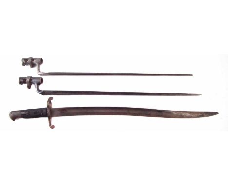 British 1858 pattern Enfield sword bayonet, also two socket bayonets, (3) the largest item measures 71.5cm We are unable to p