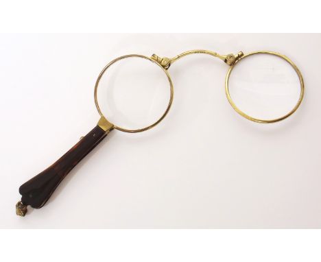 A pair of 12ct gold viewing glasses We are unable to provide condition reports for this sale.