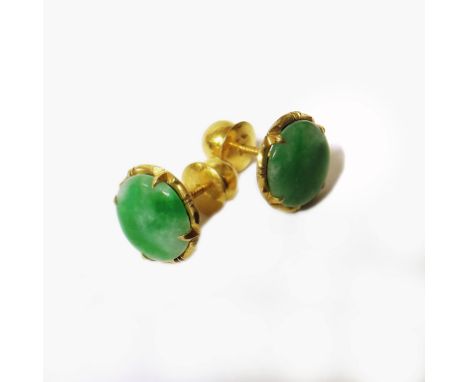 A pair of jadeite and gold earings We are unable to provide condition reports for this sale.