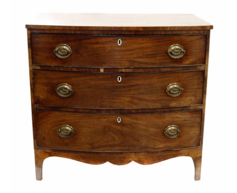 George III mahogany bow front chest of three graduated drawers, top with white wood string, each drawer inlaid with ebonised 