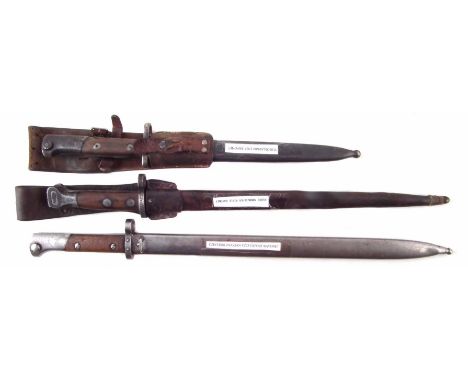 Three bayonets, to include a Czechoslovakian VZ23 export bayonet and scabbard, a Yugoslavian 1924 bayonet and scabbard with l