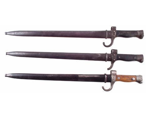 Three versions of the French Mannlicher 1892 Bayonet, each with scabbard, to include the  original pattern, modified version 