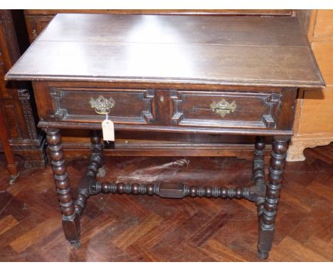 Oak Jacobean style side table. We are unable to provide condition reports for this sale.