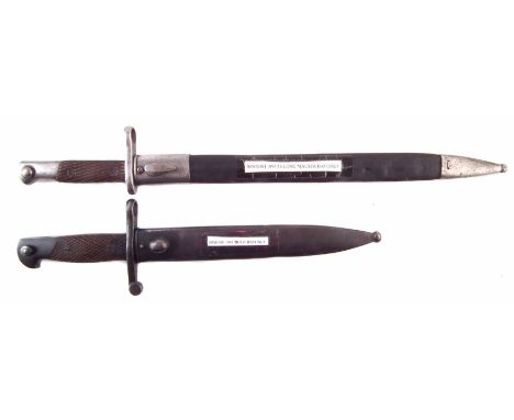 Spanish 1941 Bolo bayonet and scabbard, the blade marked Toledo, also an 1893/16 Long Mauser bayonet with leather and steel s