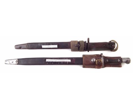Two SMLE Bayonets with scabbards and frogs, the first an Australian Lithgow 1907 pattern bayonet dated 1922, the second an In