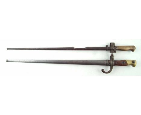 French Gras rifle 1874 bayonet and scabbard, the blade dated 1876, also a Lebel 1886 bayonet and scabbard, (2) 65cm overall l