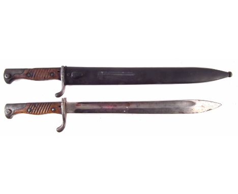 German 98/05 'Butcher' Bayonet with steel scabbard, saw back edge, together with another plain back bayonet. (2) The largest 